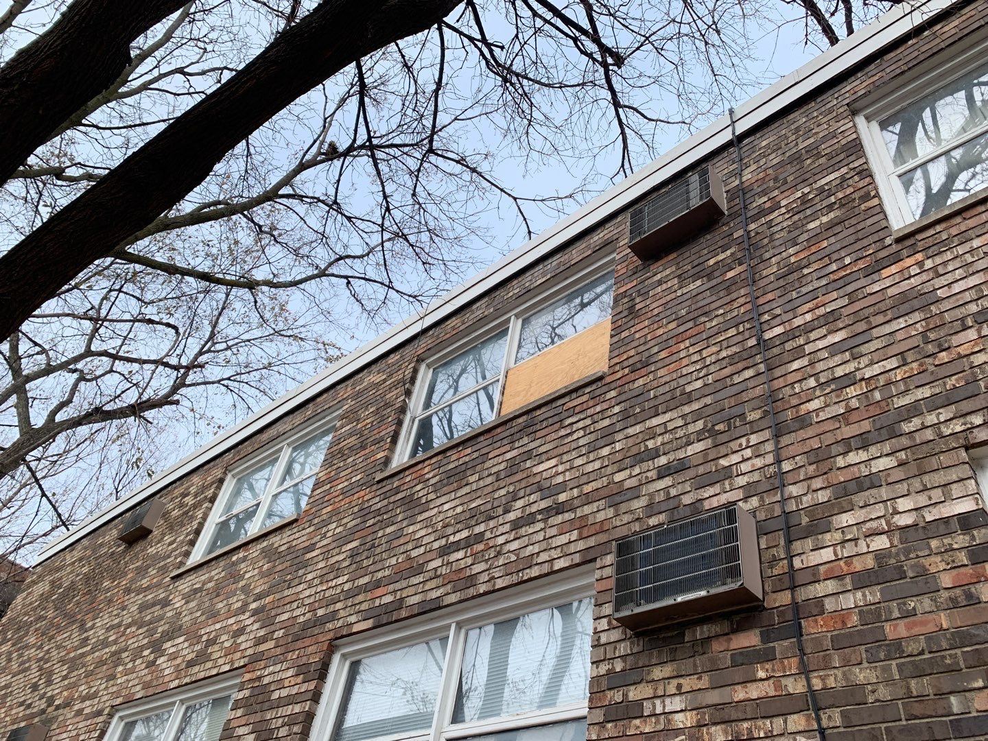 boarded up window in building