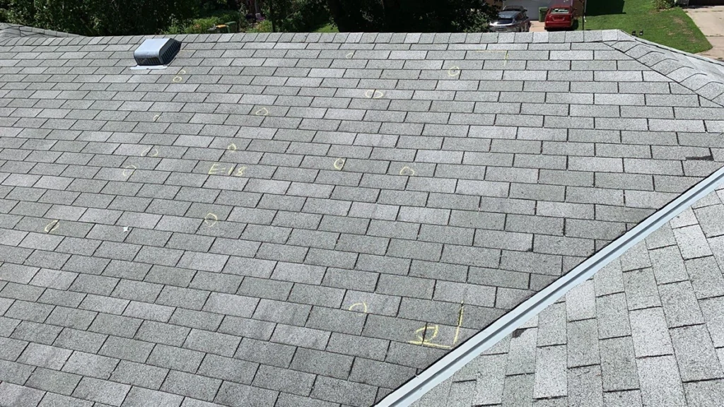 Roof with chalk markings for hail damage